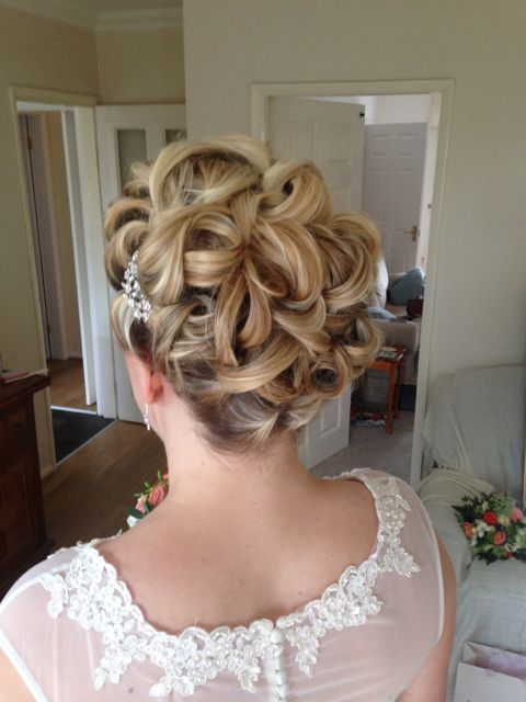 Curled traditional bridal hairstyle